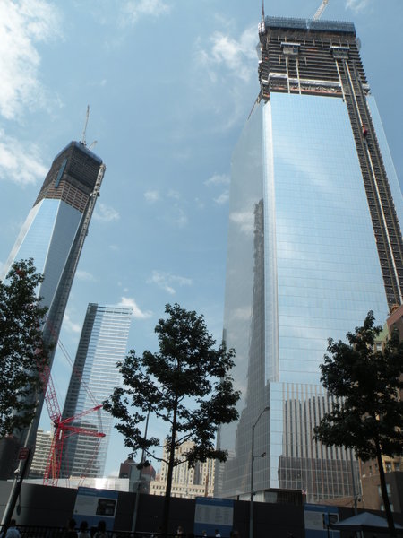 The towers disappear into light and reflection